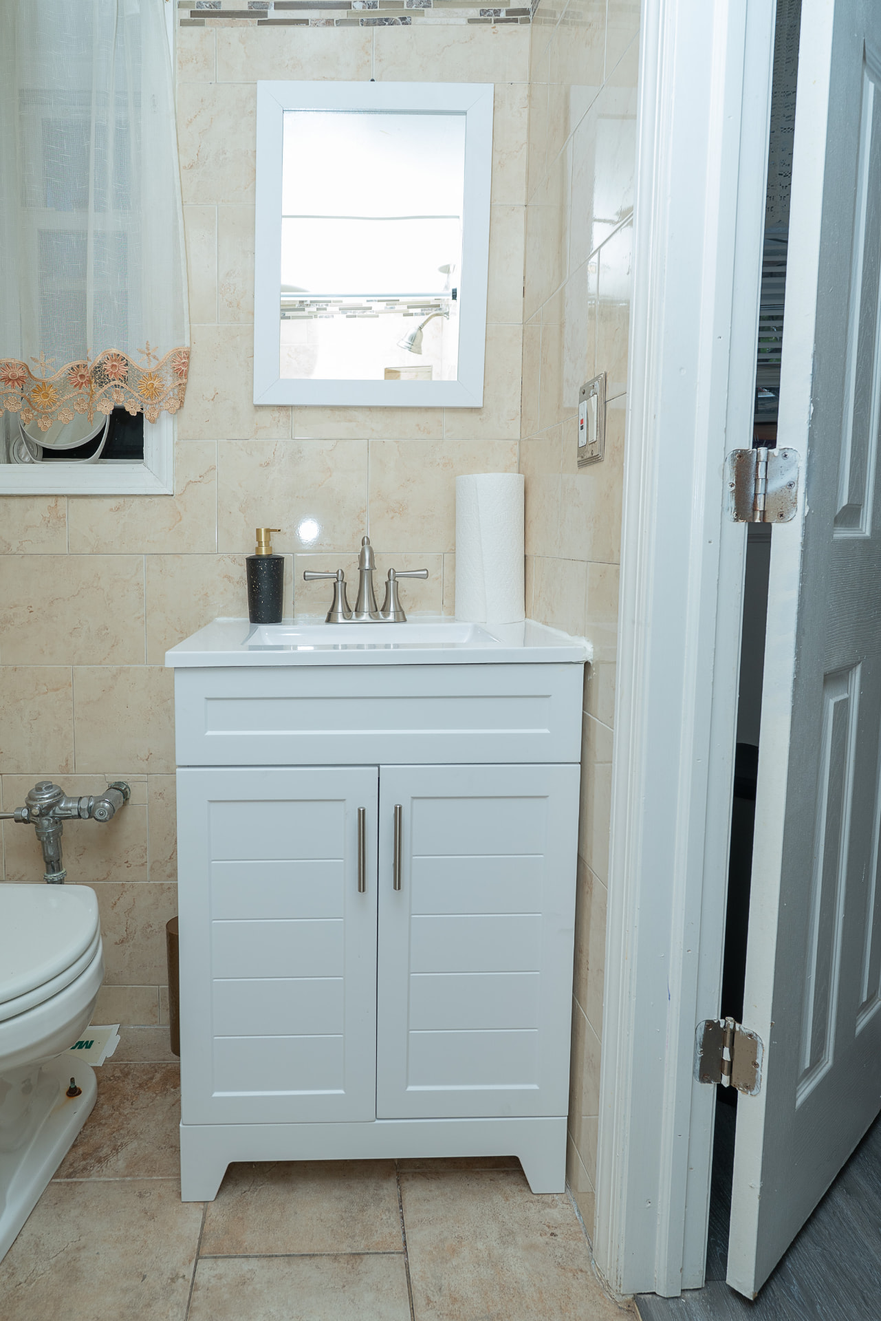 Private bathroom with a large stand-up spa shower